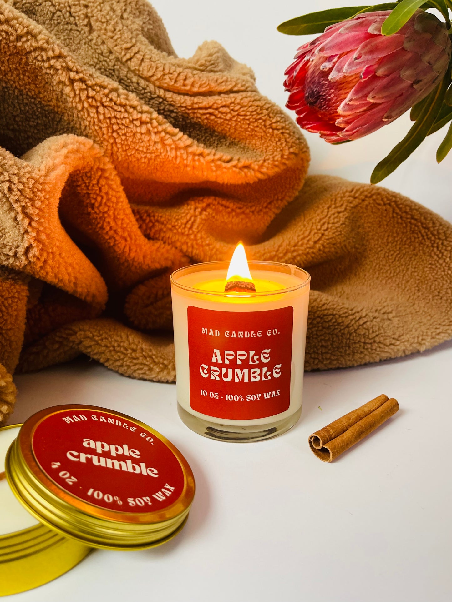 Apple Crumble 10oz Glass Jar soy Candle and 4oz travel tin front view, natural soy candle shop, scented non-toxic soy candle, wholesale handmade candles, soy candle care